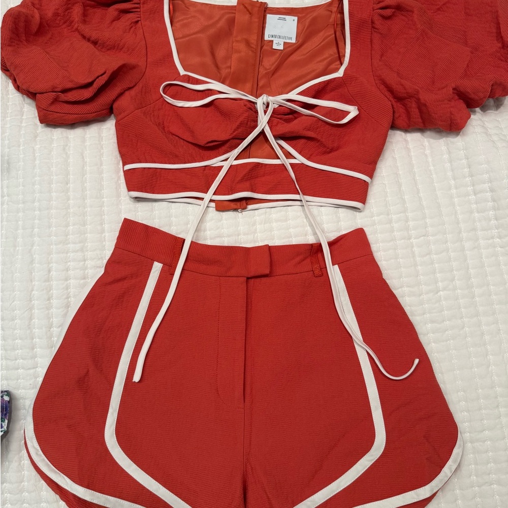 C/MEO Collective in the common Orange and White Top and Shorts Set